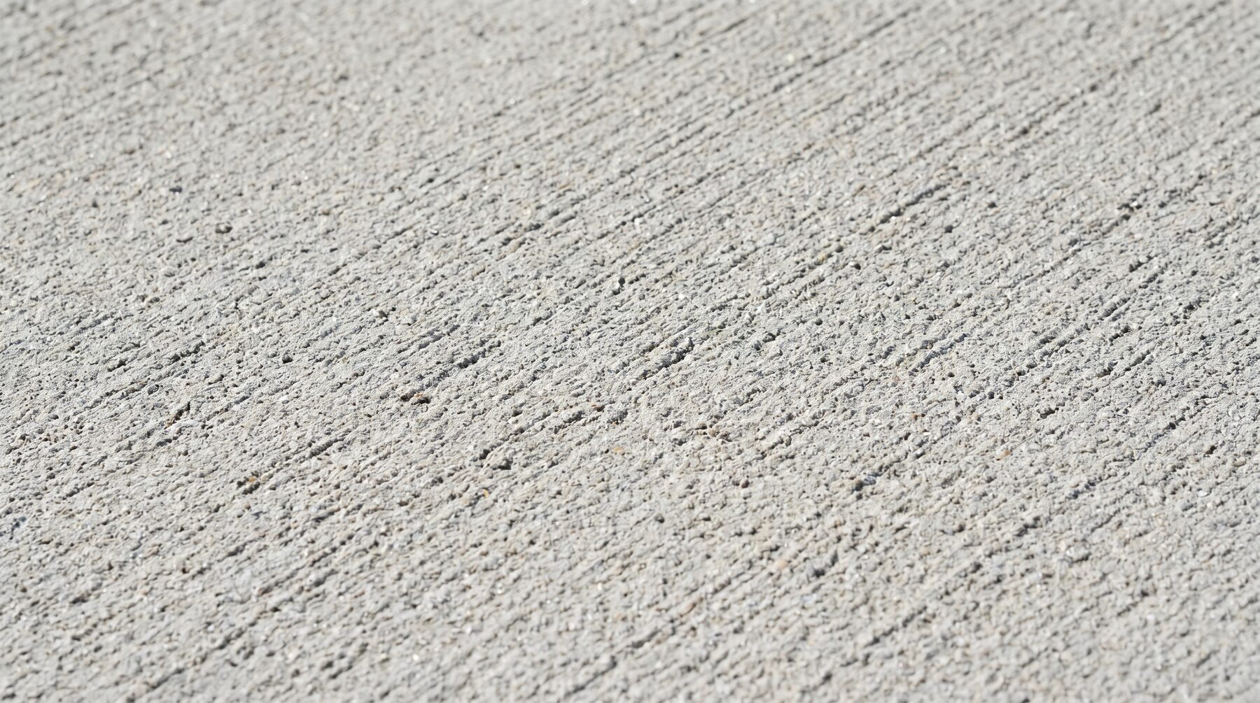 Close-up of broom-finished concrete texture