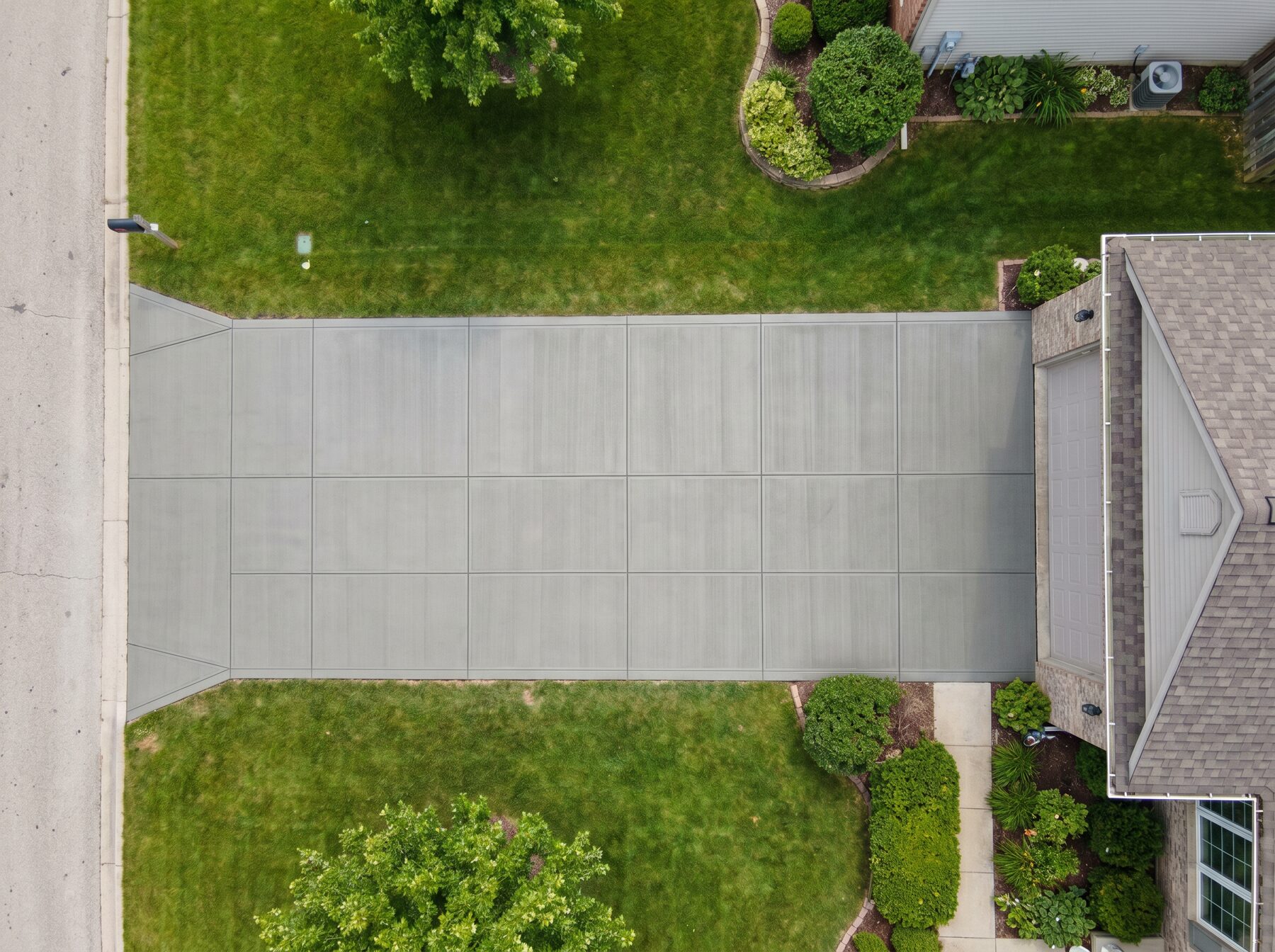 Aerial view of new concrete driveway